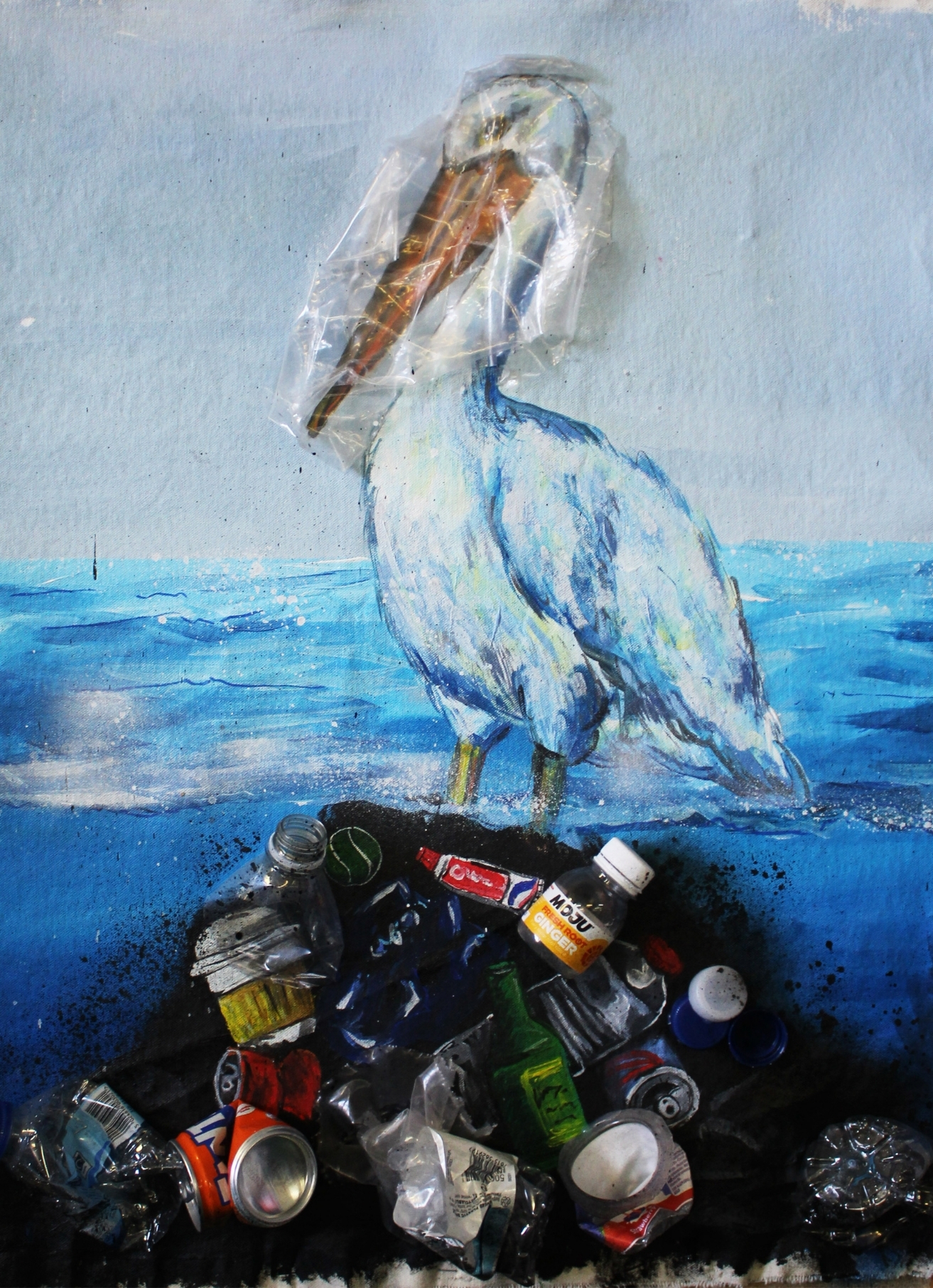 A seagull in front of a blue sea stands on a pail of garbage with plastic and aluminium canisters poking out. The seagull's head is covered with a plastic bag.